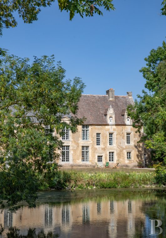 A château and its outbuildings in walled grounds to the north-east of Falaise, in Calvados - photo  n°2